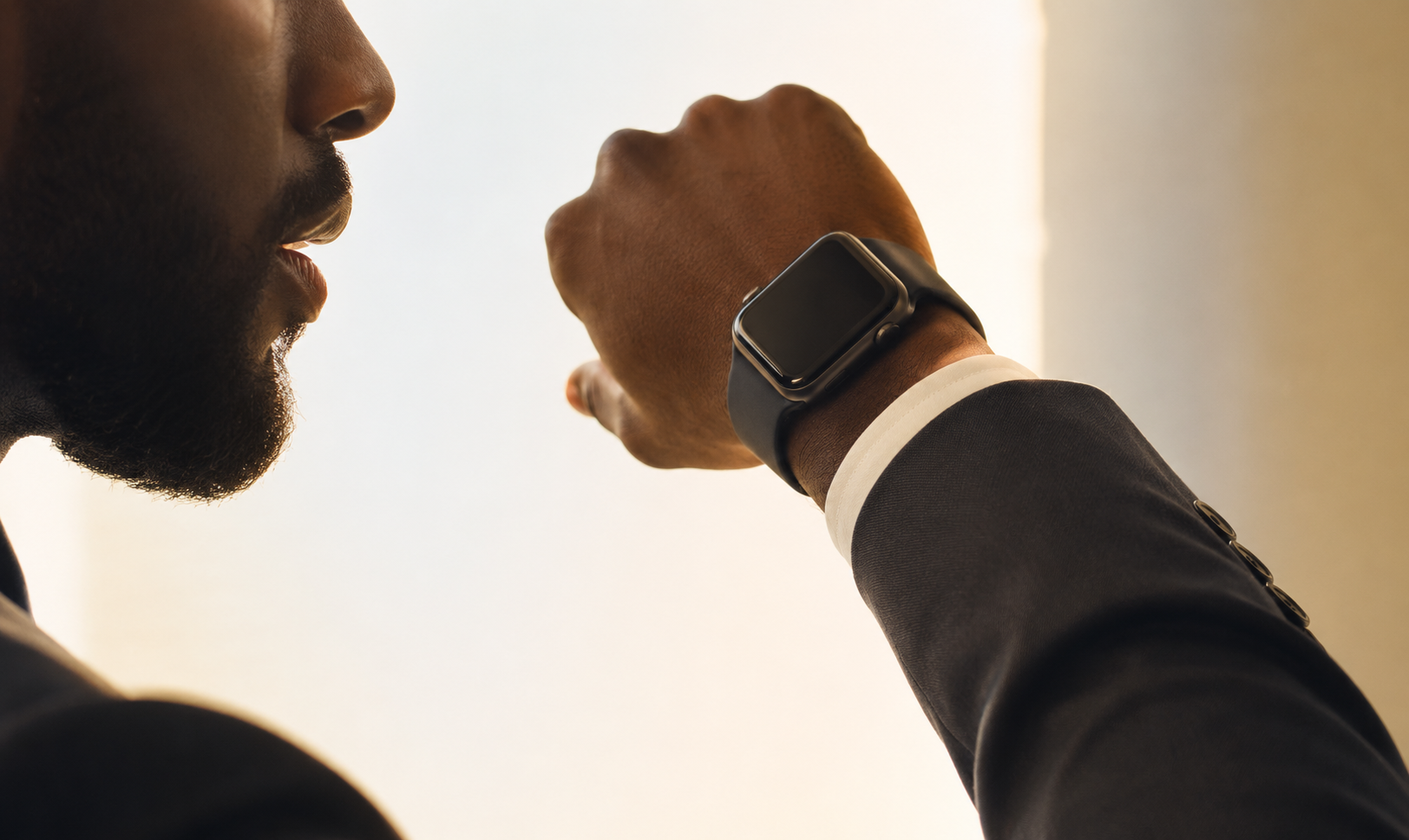 Person speaking into an Apple Watch